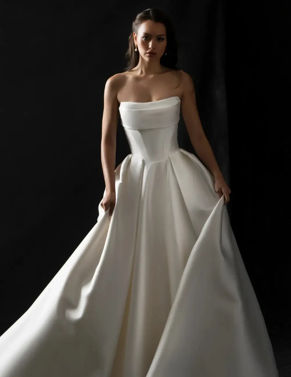 Model wearing a white Allure bridal gown