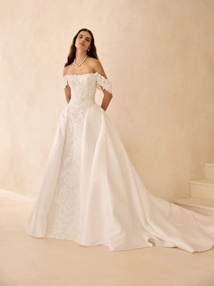 Model wearing a white La Premiere bridal gown