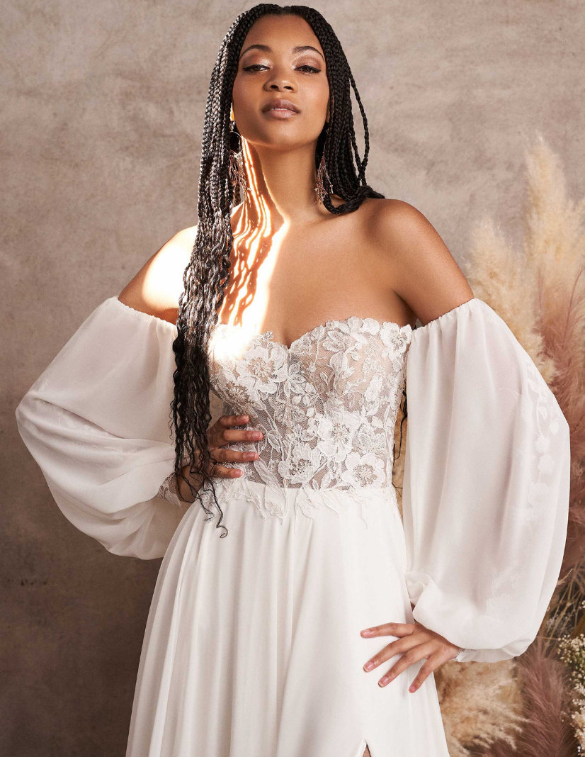 Model wearing a white Lillian West bridal gown