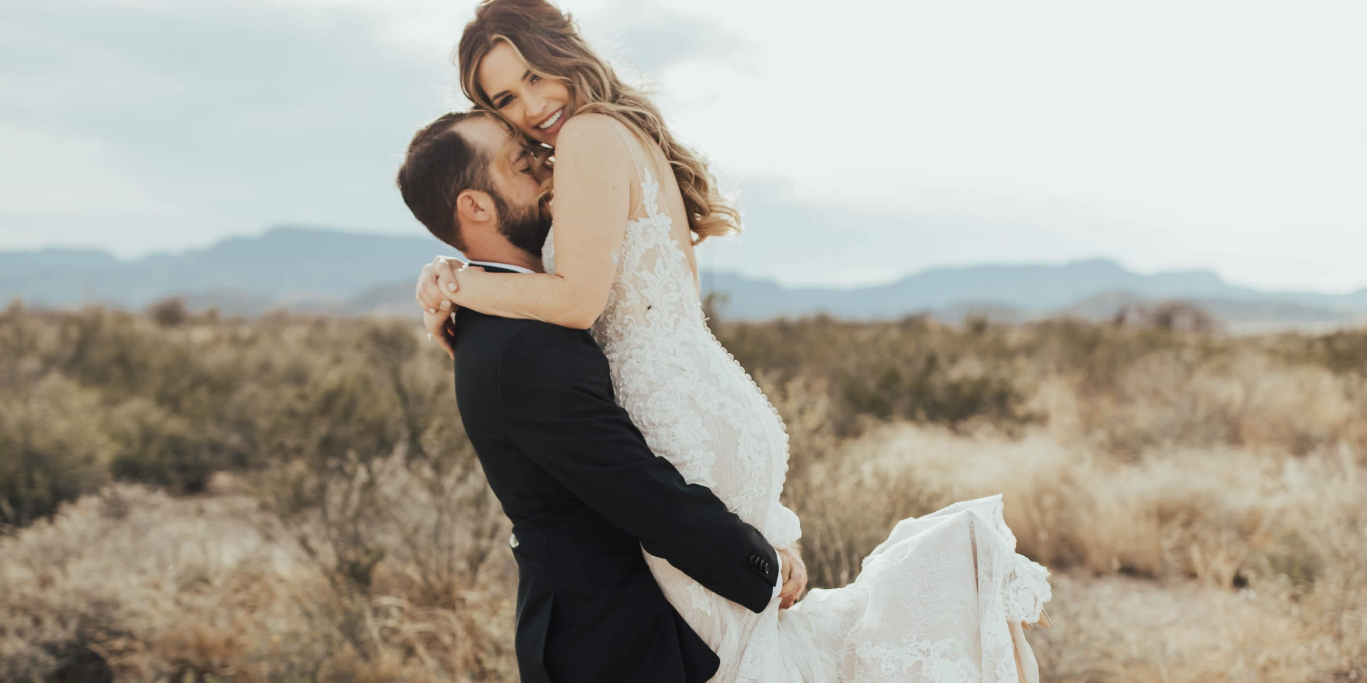 Wedding gowns at XO Bridals located in Odessa, TX. Desktop image.